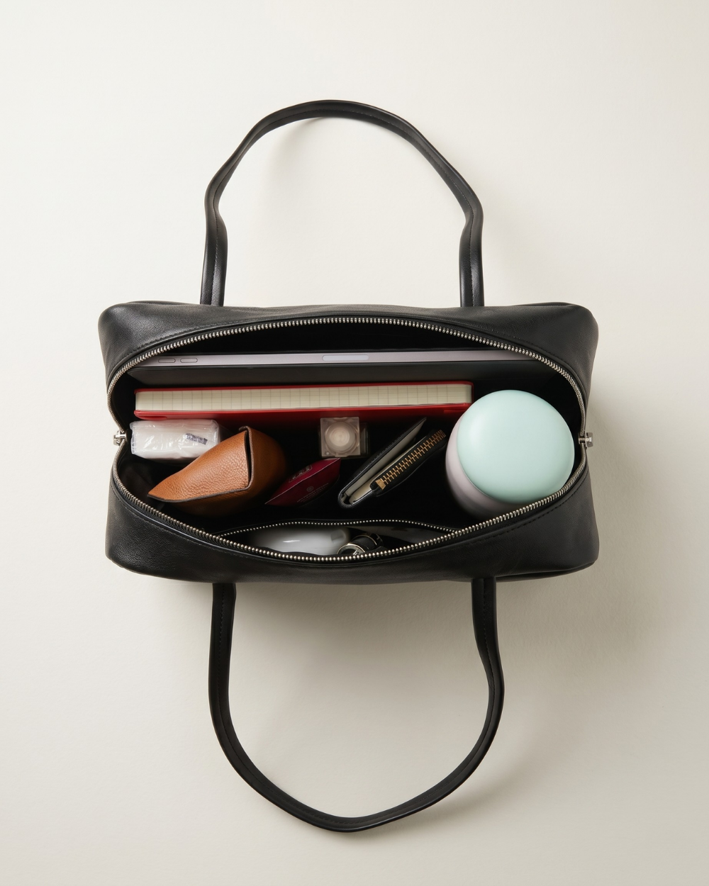 Adèle Bowling Bag in black shown for scale